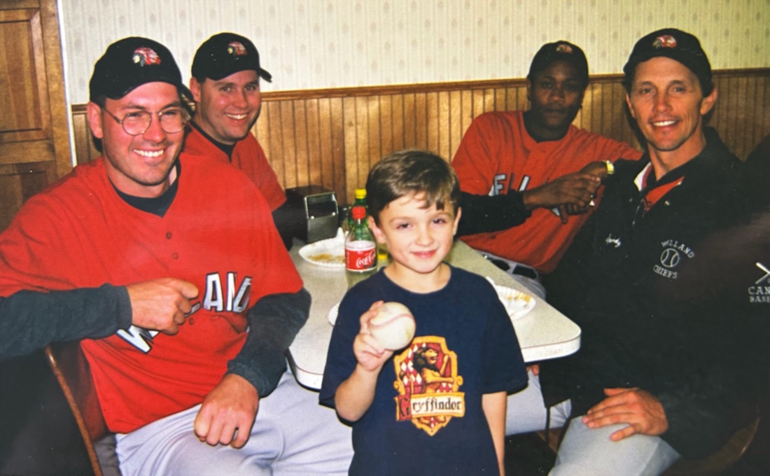 Thomas Costello as a child, playing baseball